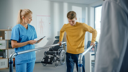 Hospital Physical Therapy: Determined Male Patient with Injury Successfully Walks His First Steps...