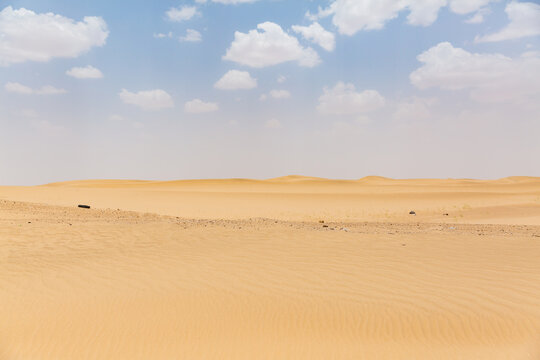 senery of beautiful vast desert and sky with clouds in marib in yemen 
