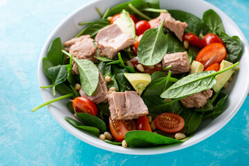 Close up of tuna spinach salad in bowl, healthy food