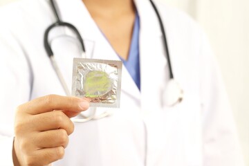 Focus on young women using condoms before sex every time to prevent AIDS.