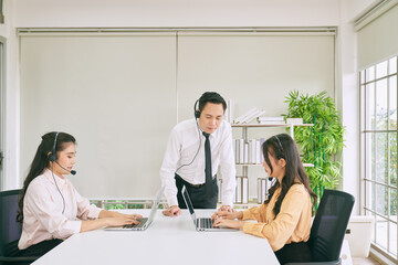 Fototapeta premium Office of call center agents for support customer case in helpdesk service solution