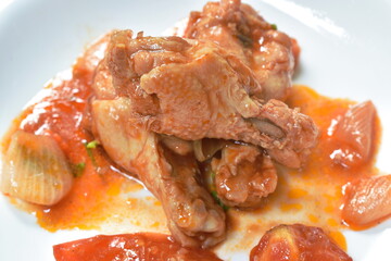fried chicken drum wing with sweet and sour sauce and vegetable on plate