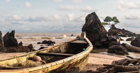 Fishing boat in a beautiful resort in Ghana Axim west Africa - obrazy, fototapety, plakaty