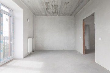 Obraz premium interior of the apartment without decoration in gray colors