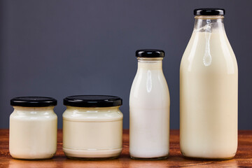 various dairy products in glass jars, organic products.