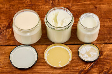 various dairy products in glass jars, organic products.