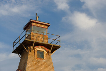 The square-tapered and shingled Cape Tryon Lighthouse on Prince Edward Island