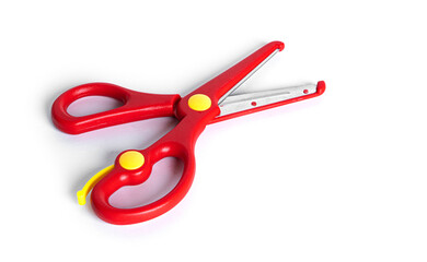 Red stationery scissors isolated on a white background.