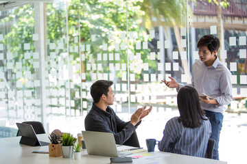 Start-up Asia business team in meeting and helped analyze the marketing problems of the company or beginning new project. Start up concept