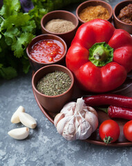 Pepper,paprika, basilik.Georgian food. Georgian spices on a plate.