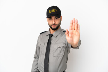 Young arab man isolated on white background making stop gesture
