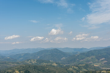 Fascinating panorama of sunset and landscape in the mountains on the hill, Ukrainian Carpathians mountains. Colored and their mountain landscapes. Nature concept
