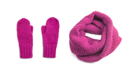 Pink mittens and pink scarf isolated on white background