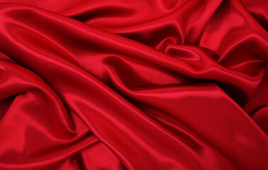 Smooth elegant red silk or satin luxury cloth texture as abstract background. Luxurious valentines day background design