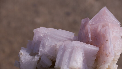 Close up of natural light pink salt crystals found at the salt pans on the coast of Namibia, Africa.