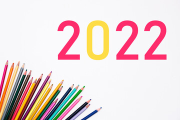 2022 school year with heap colored pencils isolated on white background. Banner. Creative development and education of preschoolers, children and adults. Art stationery shop card. Year color. Mockup