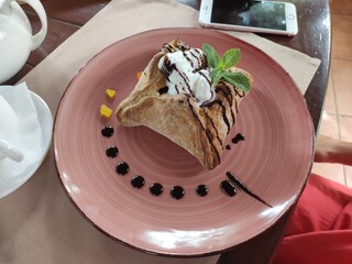 Apple strudel with ice cream. Handmade dessert.