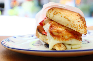 Traditional delicious sandwich, called as Kumru in Turkish, snack with rich ingredients. Special sesame bread sandwich.