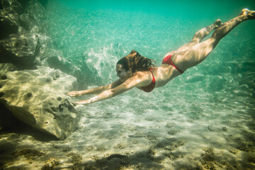 Woman Enjoying In Underwater World