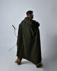 Full length  portrait of  young handsome man  wearing  medieval Celtic adventurer costume with...