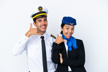 Airplane pilot and mixed race air hostess isolated on white background making phone gesture. Call me back sign