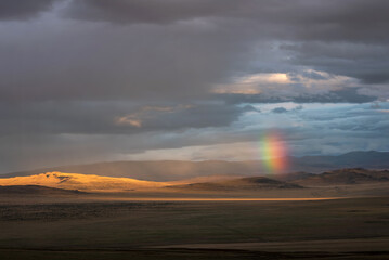 rainbow steppe mountains rain clouds sky summer