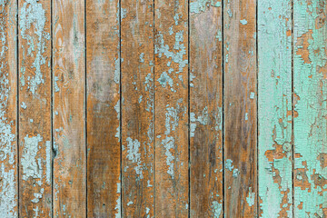 Fototapeta na wymiar the background is made of old boards with peeling paint