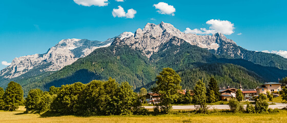 Beautiful alpine summer view with the famous Loferer Steinberge mountains in the background near...
