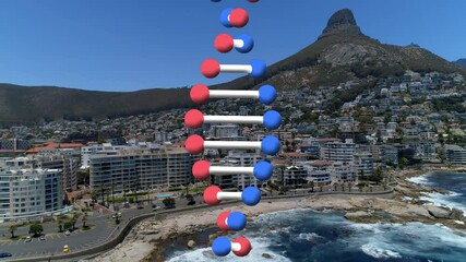 Animation of rotating dna strand moving over mountain and modern coastal town - Powered by Adobe