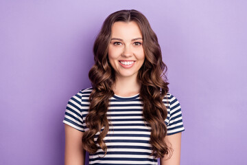 Obraz premium Photo of pretty sweet young lady wear striped t-shirt smiling isolated purple color background