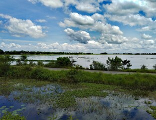 Obraz premium clouds over the lake in a different look