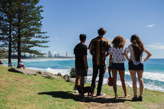 Multicultural Teenagers Hang Out Near The Beach