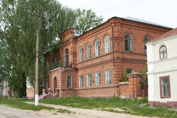 Fototapeta na wymiar Temnikov, Mordovia, Russia - May 24, 2021: The former building of the city government. Architectural monument. mid-19th century.