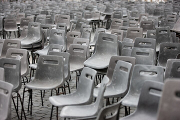 Obraz premium Rows of seats or chairs. Empty chairs after the performance