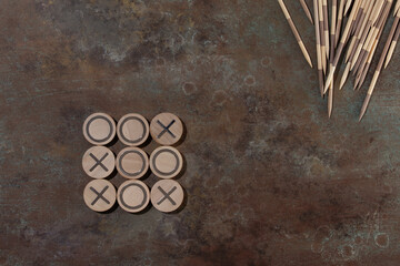 Traditional Japanese Board Game  Mikado and TIC-TAC-toe game wooden. Bamboo sticks from the game on...
