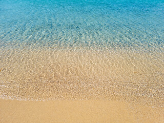 Fototapeta na wymiar Ornos empty sandy beach Mykonos island, Cyclades Greece.