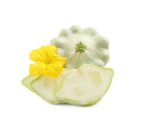 Whole and cut pattypan squashes with flower on white background