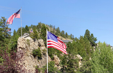 American flag, POW-MIA flag, state flag of South Dakota