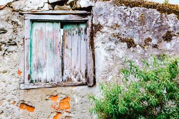 Old deserted house with wooden door