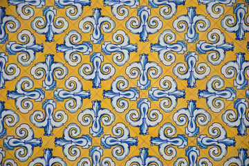 Typical Valencian ceramic decoration in yellow and blue tones.