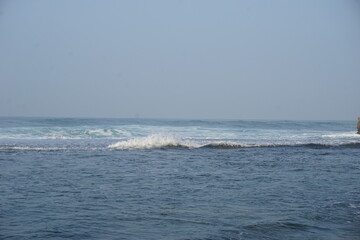 Mesra beach with a natural background. Mesra means intimate. Mesra beach also known as kukup beach or ngrawe beach