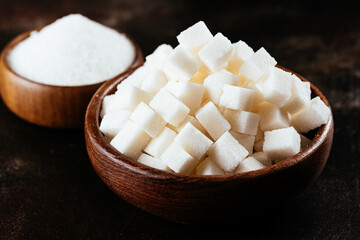 cube sugar in a wooden bowl