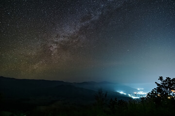 Fototapeta na wymiar Milky Way, night sky Mon Muen Mak, Chiang Mai, Thailand