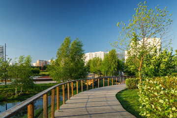 Summer sunset view of Yuzhnoe Butovo park in South Butovo district, Moscow, Russia.
