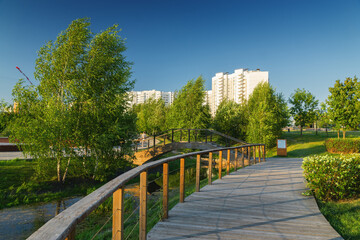 Summer sunset view of Yuzhnoe Butovo park in South Butovo district, Moscow, Russia.