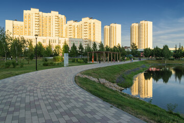 Summer sunset view of Yuzhnoe Butovo park in South Butovo district, Moscow, Russia.