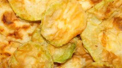 Zucchini fried in sunflower oil.Grilled zucchini.Fried zucchini in slices.