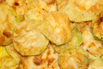 Zucchini fried in sunflower oil.Grilled zucchini.Fried zucchini in slices.