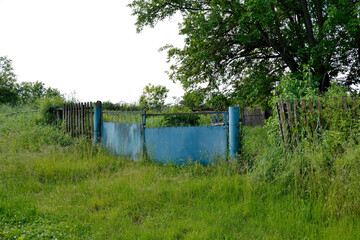 Beautiful old gate from abandoned house in village