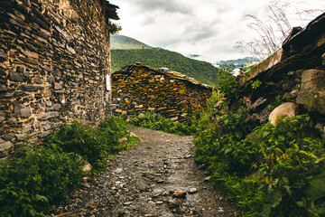 Fototapeta na wymiar A beautiful landscape photography with old village Usghuli in Caucasus Mountains in Georgia.